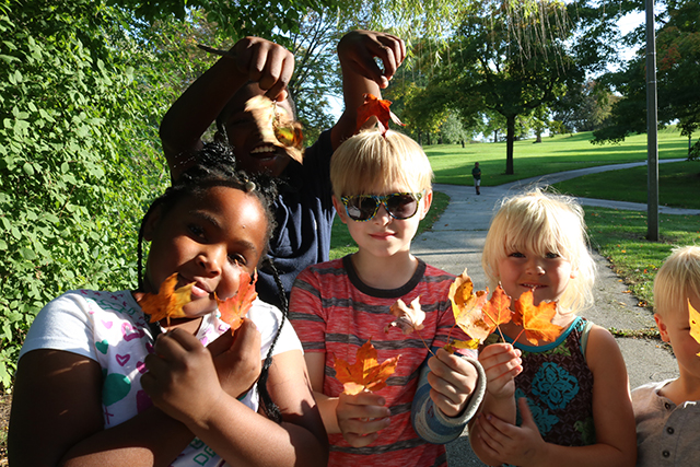 Kids playing outside in Autumn