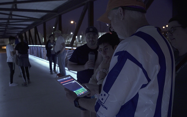 Community scientists monitoring bats at the Urban Ecology Center-Menomonee Valley during a spring migration acoustic bat monitoring survey in April 2018. Photos by Chicago-area documentary filmmaker Marianna Milhorat.