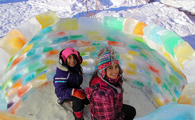 Kids in snow fort at Winterfest