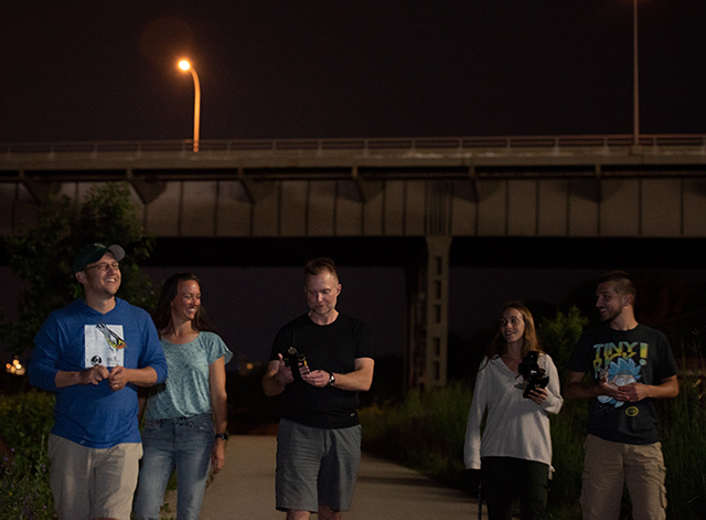 Community scientists participating in a bat survey at Menomonee Valley.