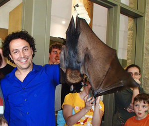 Rob Mies, executive director of the Organization for Bat Conservation, holding a huge bat!