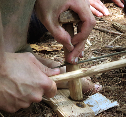 starting a fire with a bow drill
