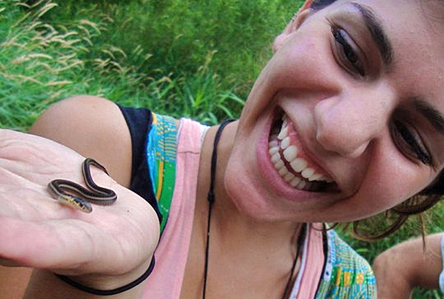 snake research smiling woman