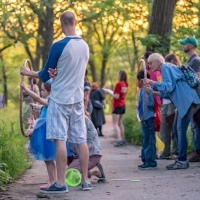 Community scientists searching for fireflies at Riverside Park.